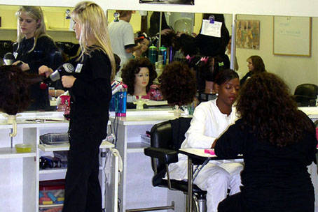 Students practicing cosmetology skills