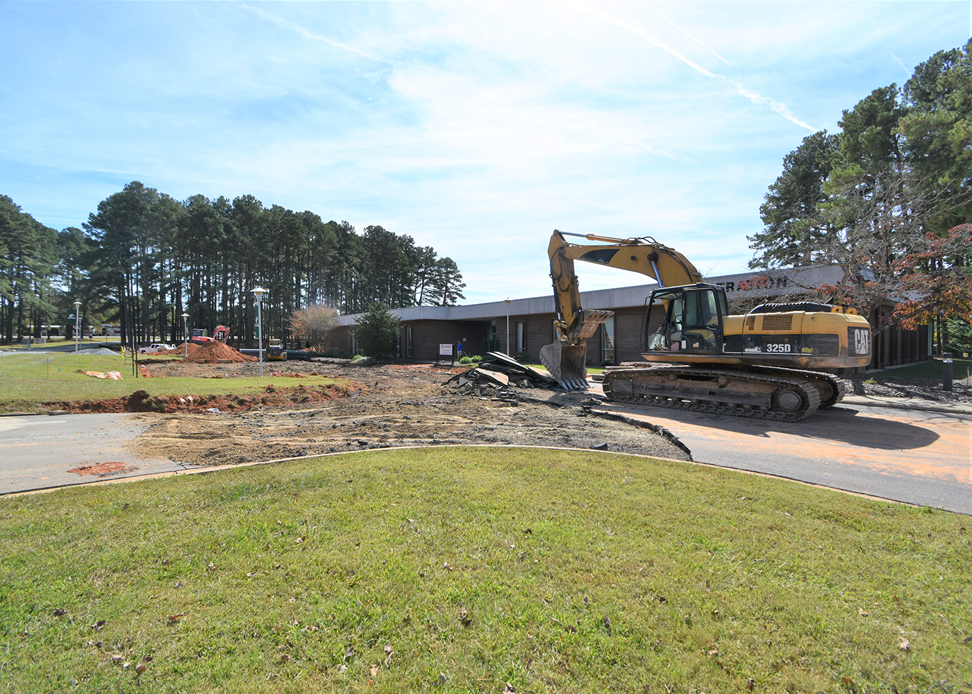 Crews are removing the parking lot of the Administration building, so the lot can be expanded, 10/6/2022.